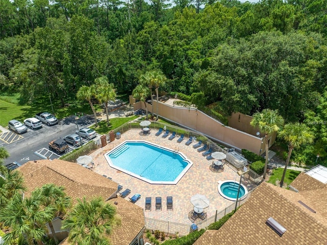 view of swimming pool featuring a patio area