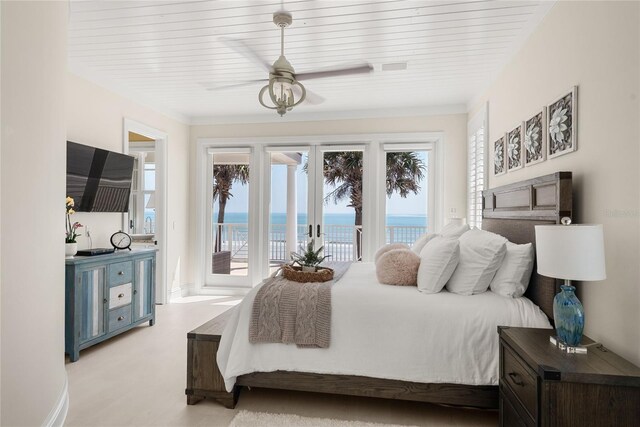 carpeted bedroom featuring ceiling fan and access to outside