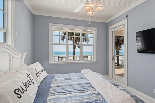 bedroom featuring ornamental molding and ceiling fan