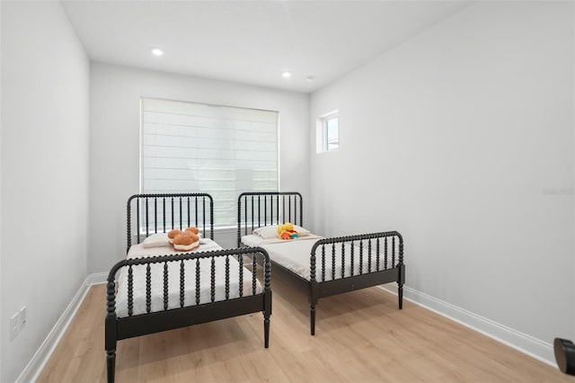 bedroom featuring light hardwood / wood-style floors