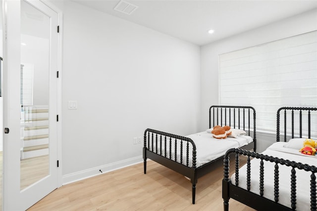 bedroom featuring light hardwood / wood-style floors