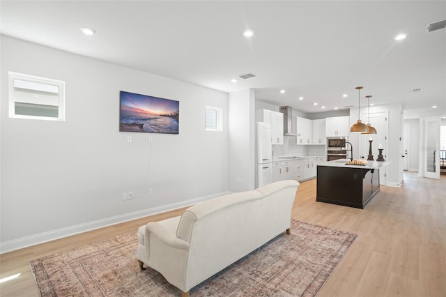 living room featuring light hardwood / wood-style flooring