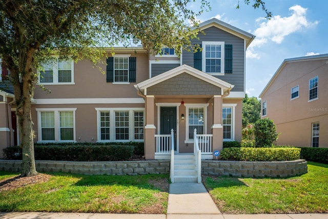 view of front of property featuring a front yard