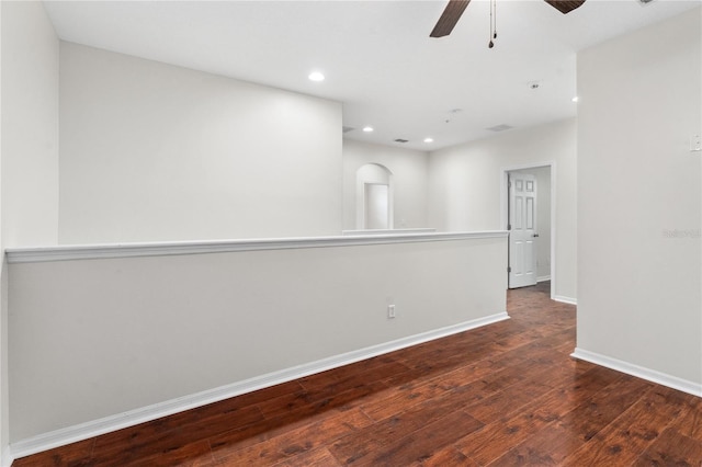 unfurnished room featuring ceiling fan and wood-type flooring