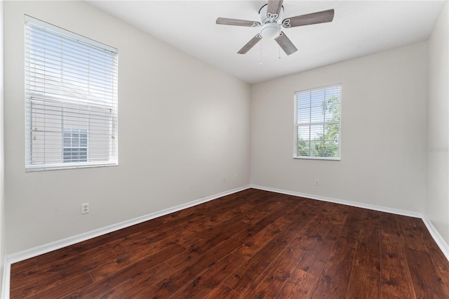 spare room featuring ceiling fan and hardwood / wood-style floors