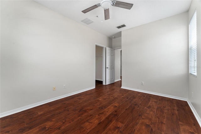 empty room featuring hardwood / wood-style floors and ceiling fan