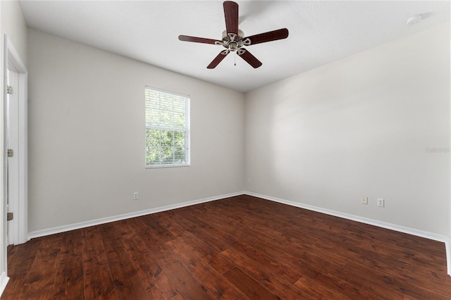 spare room featuring ceiling fan and hardwood / wood-style flooring