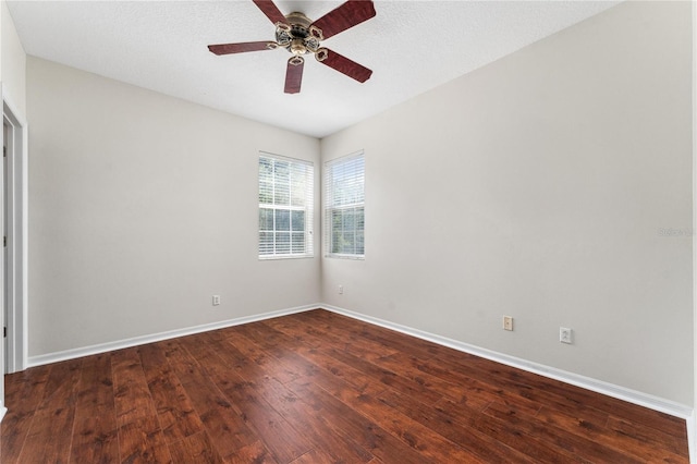 unfurnished room with ceiling fan and wood-type flooring