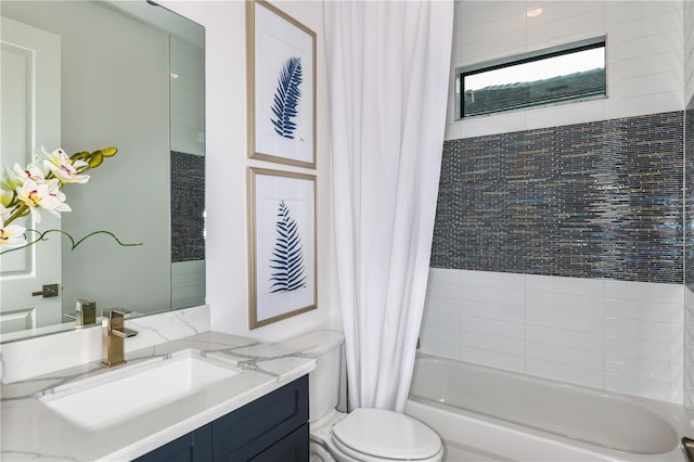 full bathroom featuring shower / tub combo, vanity, and toilet