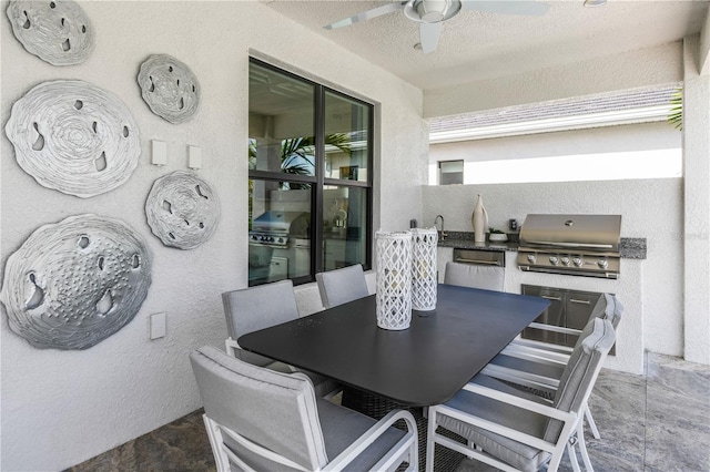 tiled dining area featuring ceiling fan