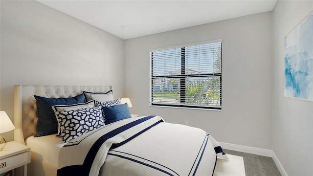 4990 Fairhope Cir, Lakewood Ranch, FL 34211 - carpeted bedroom with baseboards