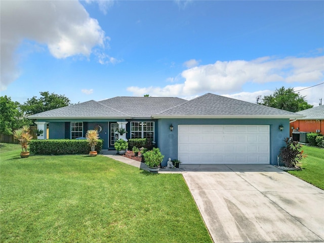 ranch-style house with a garage and a front yard