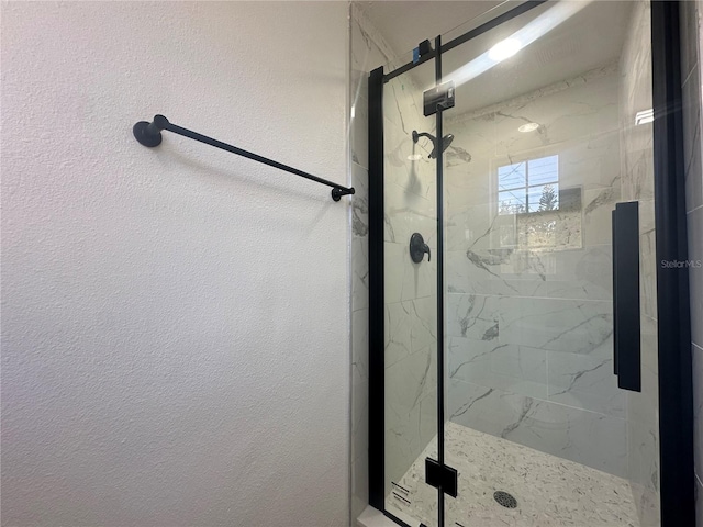 bathroom with an enclosed shower