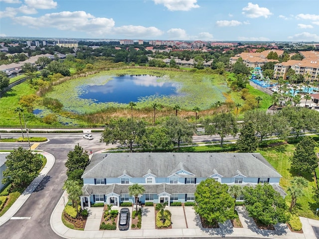 birds eye view of property featuring a water view