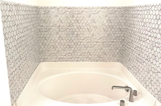 full bath featuring a bath