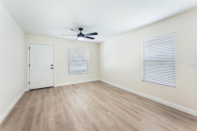 interior space with ceiling fan and light wood-type flooring