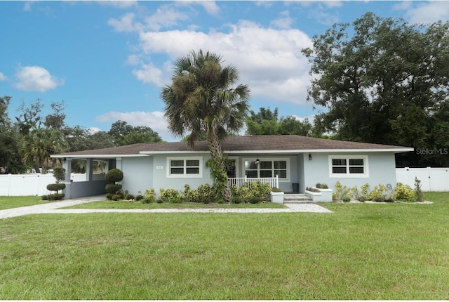 single story home with a front yard