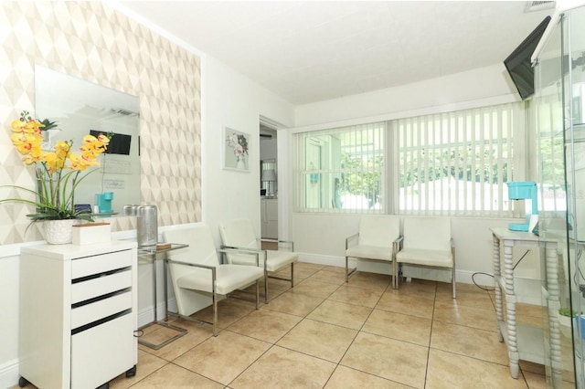 living area with light tile patterned floors