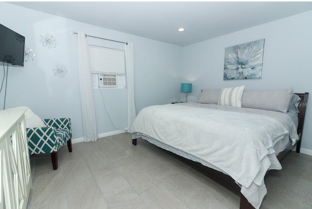 bedroom with cooling unit and light tile patterned floors