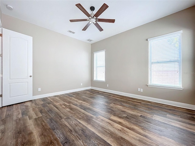 empty room featuring ceiling fan and wood-type flooring