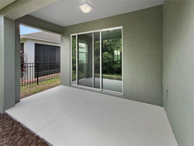 view of patio with fence