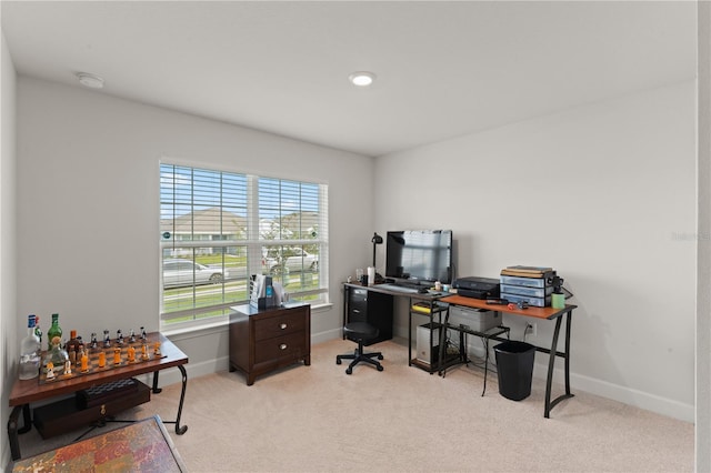 office area with light colored carpet