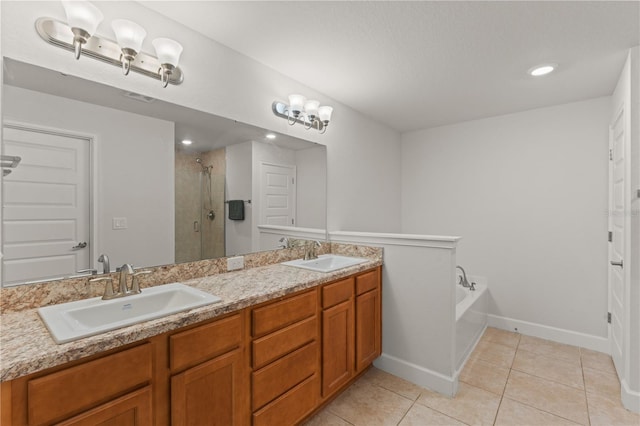 bathroom with shower with separate bathtub, double sink vanity, and tile patterned floors