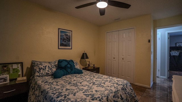 bedroom with a closet and ceiling fan