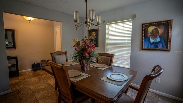 dining area featuring a chandelier