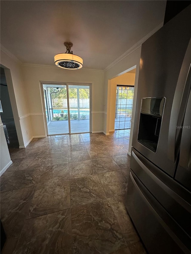 interior space with crown molding