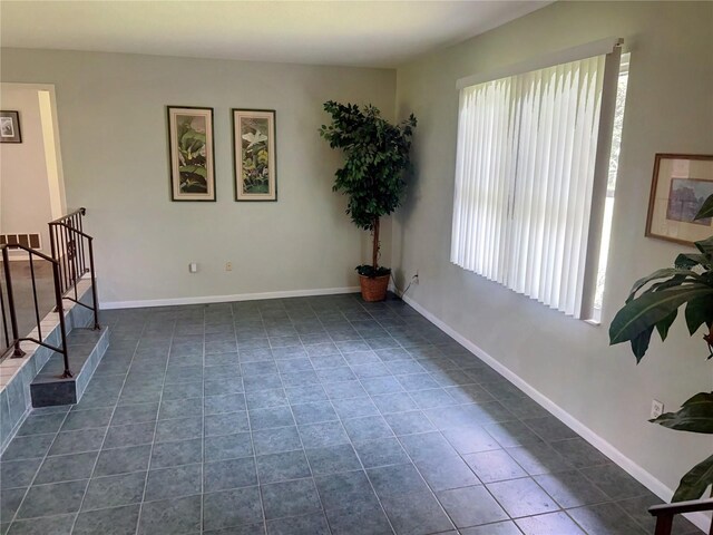 interior space with plenty of natural light and tile patterned floors