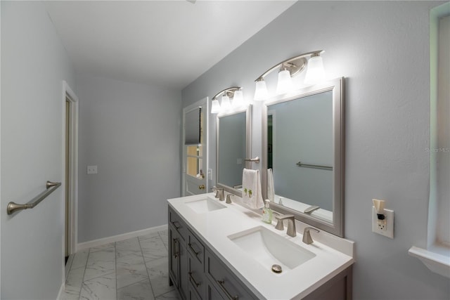 bathroom featuring dual vanity and tile patterned floors