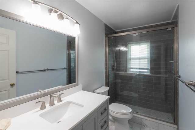 bathroom featuring an enclosed shower, toilet, vanity, and tile patterned floors