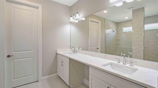 4910 Carova Way, Lakewood Ranch, FL 34211 - full bath featuring visible vents, a marble finish shower, a sink, and marble finish floor