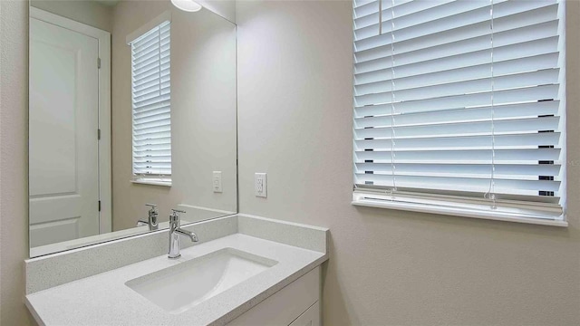 4910 Carova Way, Lakewood Ranch, FL 34211 - bathroom featuring plenty of natural light and vanity