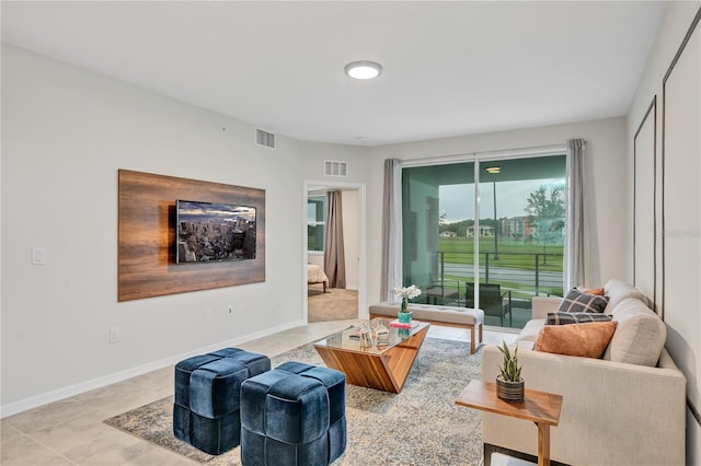 living room featuring light tile patterned flooring