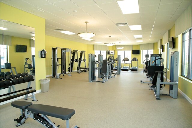 workout area with visible vents and baseboards