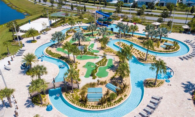 birds eye view of property featuring a water view
