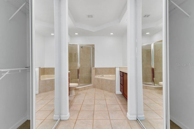 full bathroom with tile patterned floors, vanity, and toilet