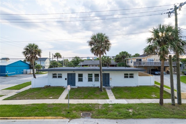 view of front of house with a front lawn