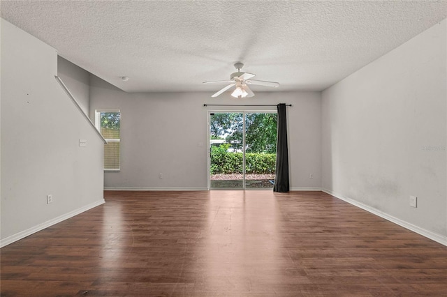 unfurnished room with a textured ceiling, ceiling fan, and hardwood / wood-style flooring