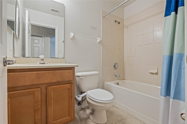 full bathroom with toilet, vanity, shower / bath combo, and tile patterned floors