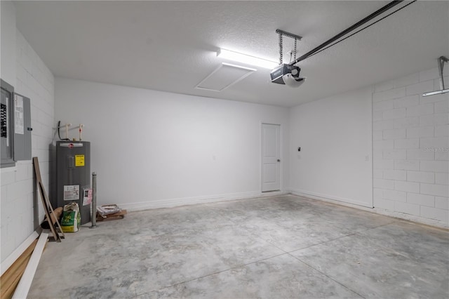 garage featuring water heater, a garage door opener, and concrete block wall
