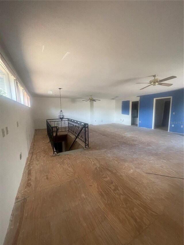 basement with ceiling fan