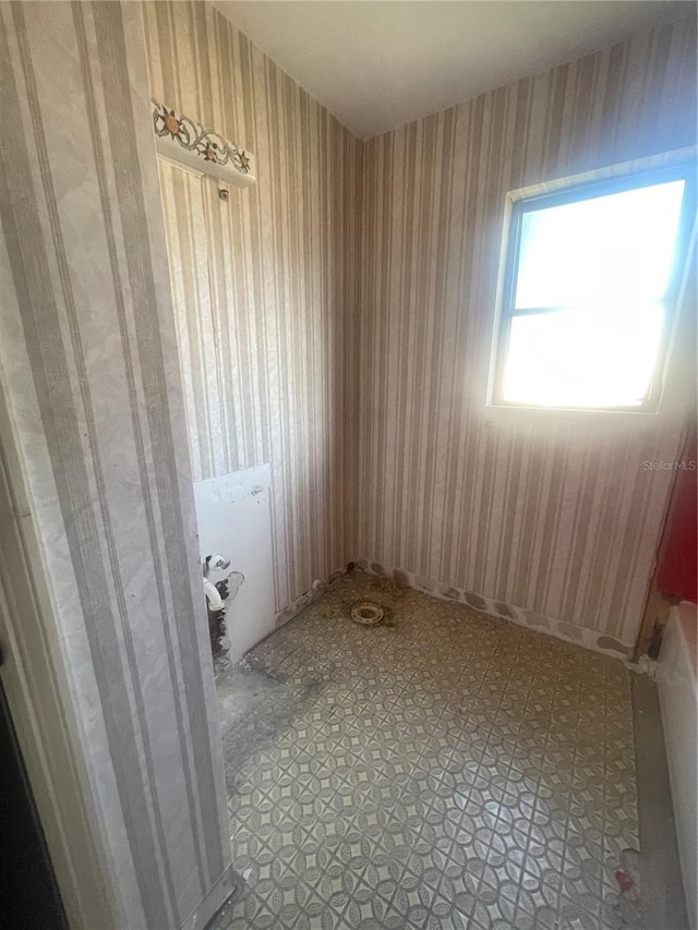 spare room with tile patterned flooring