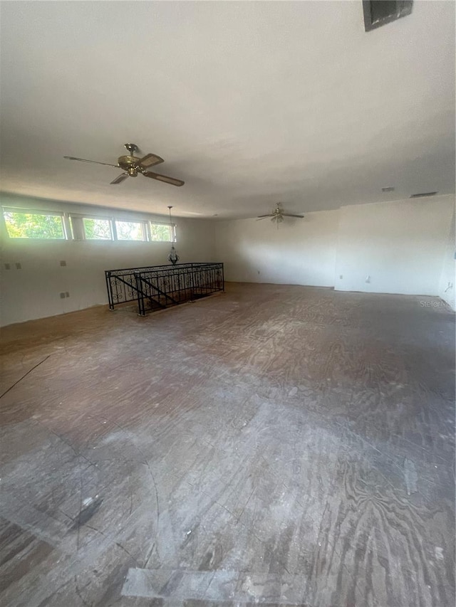 interior space featuring ceiling fan