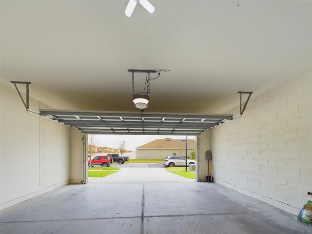 1502 Jadewood Way, Kissimmee, FL 34744 - garage with a garage door opener