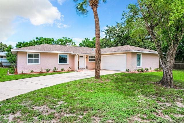 ranch-style house with a front lawn and a garage