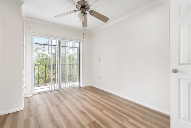 empty room with plenty of natural light, ceiling fan, and light wood-type flooring