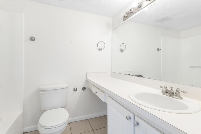 full bathroom with toilet, tile patterned flooring, vanity, bathing tub / shower combination, and a textured ceiling